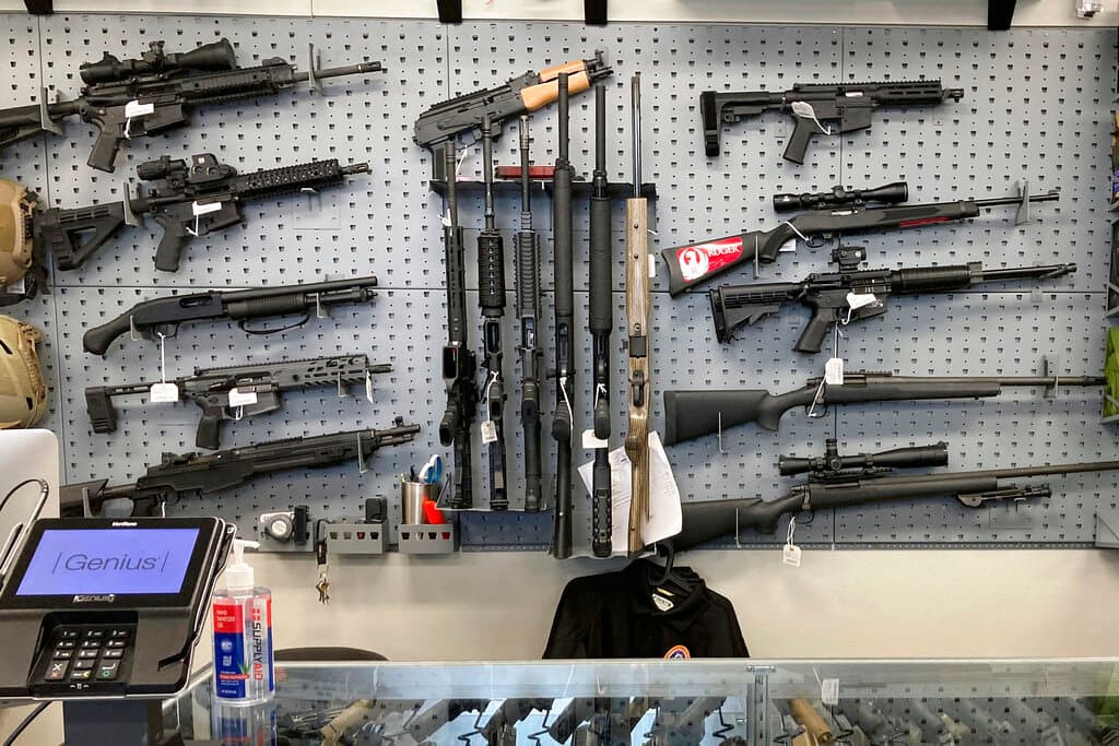 Firearms on display at a gun shop. Firearms on display at a gun shop.